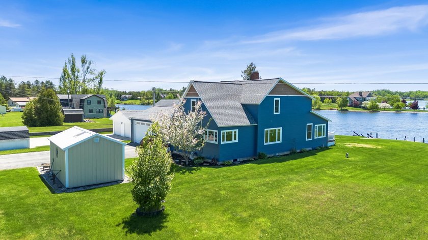 Enjoy stunning views of the Black and Cheboygan Rivers at their - Beach Home for sale in Cheboygan, Michigan on Beachhouse.com