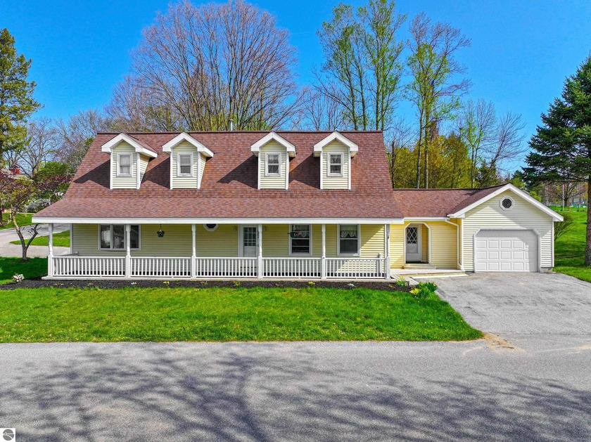 Embrace the Northern Michigan lifestyle in Onekama-Cape Cod - Beach Home for sale in Onekama, Michigan on Beachhouse.com