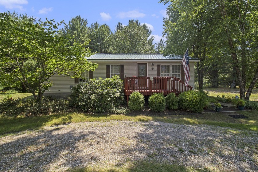 Experience the perfect blend of comfort and nature in this - Beach Home for sale in Manistee, Michigan on Beachhouse.com