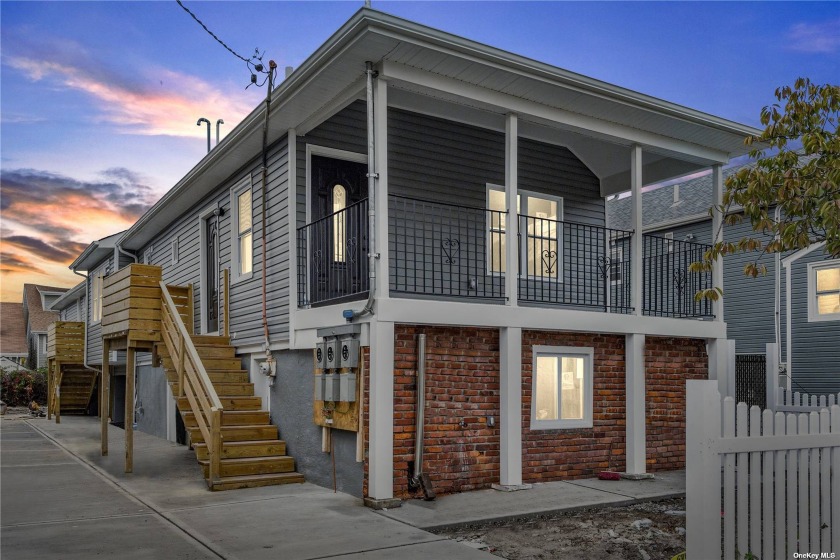 Welcome home to this brand new 2 family home conveniently - Beach Home for sale in Far Rockaway, New York on Beachhouse.com