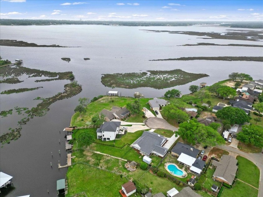 WATERFRONT HOME ON THE BACK BAY IN BILOXI! This property has - Beach Home for sale in Biloxi, Mississippi on Beachhouse.com