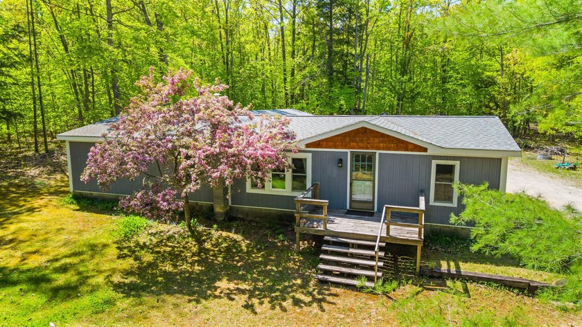 Meticulously kept 3-bedroom, 2-bath home on nearly 20 acres of - Beach Home for sale in Cheboygan, Michigan on Beachhouse.com