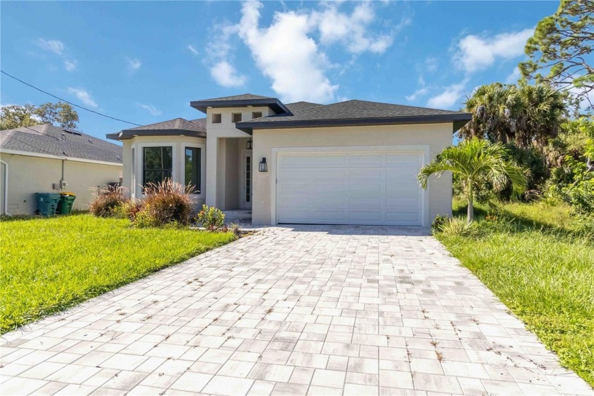This brand-new, custom-built residence is nestled in the serene - Beach Home for sale in Rotonda West, Florida on Beachhouse.com
