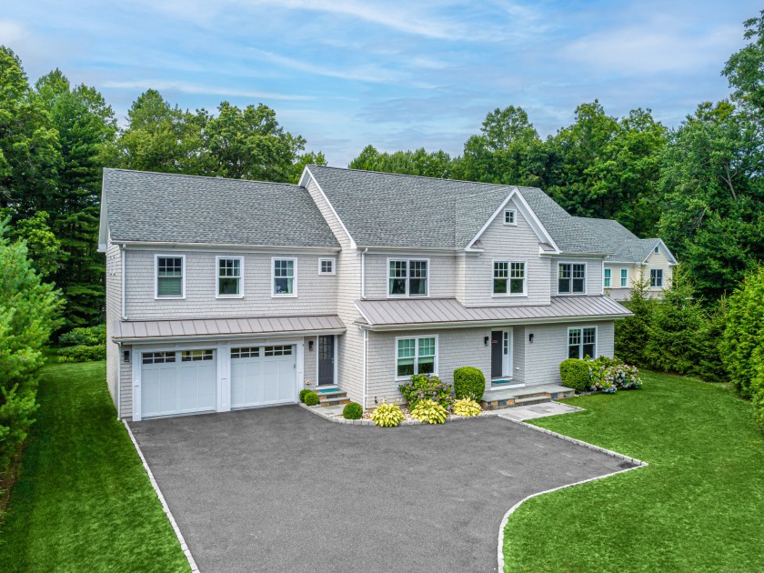 Step into over 6000 sqft of sophisticated living space across 4 - Beach Home for sale in Westport, Connecticut on Beachhouse.com