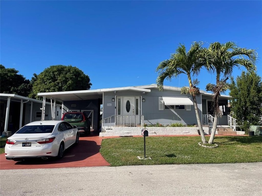 Beautiful 3/2 double wide with carport - 2 huge sheds - screened - Beach Home for sale in Davie, Florida on Beachhouse.com