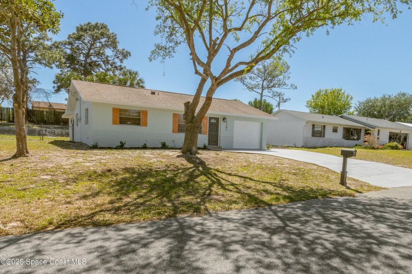 This stunning, updated home with high-end upgrades will make - Beach Home for sale in Cocoa, Florida on Beachhouse.com