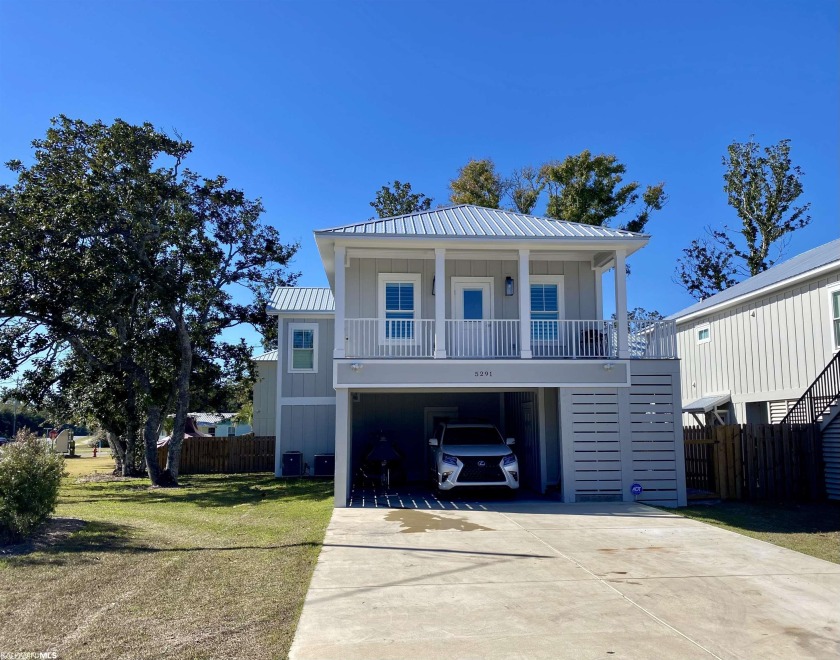 Welcome to your dream coastal retreat! This immaculate, still - Beach Home for sale in Orange Beach, Alabama on Beachhouse.com