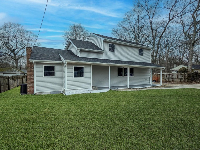 Welcome home to 206 Longfellow Dr in Mastic Beach. This 4 - Beach Home for sale in Mastic Beach, New York on Beachhouse.com