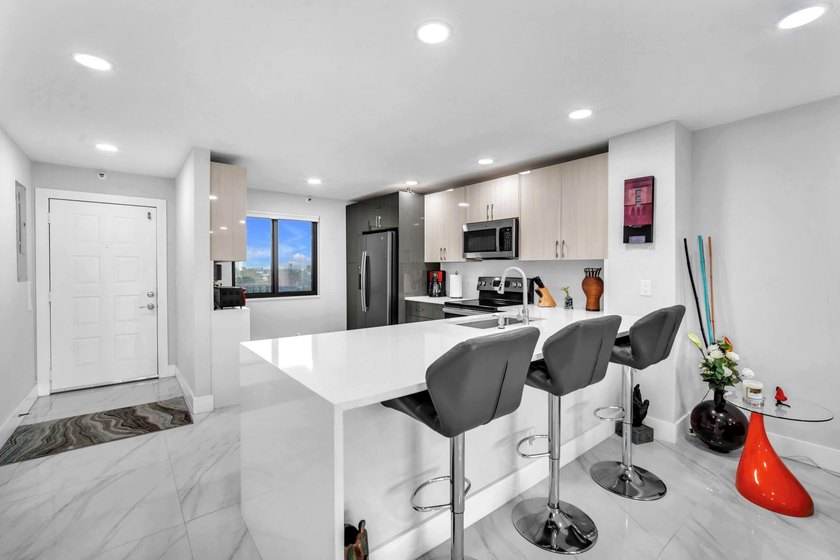 Impeccably renovated 2BR/2Bath corner condo showcasing - Beach Condo for sale in Pompano Beach, Florida on Beachhouse.com