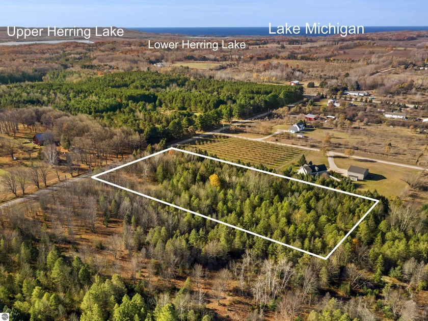 This 5-acre wooded parcel offers flat terrain, abundant wildlife - Beach Acreage for sale in Frankfort, Michigan on Beachhouse.com