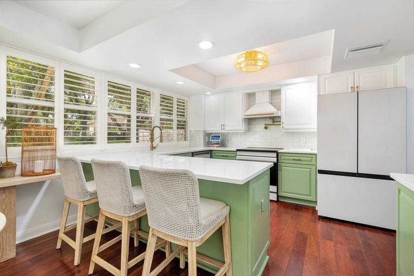 Featuring a new 2025 roof and 2025 AC, this beautifully updated - Beach Townhome/Townhouse for sale in Lake Clarke Shores, Florida on Beachhouse.com