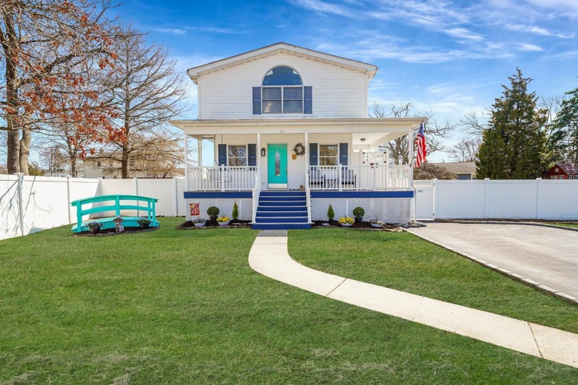 Welcome to Your New Home! This Beautiful Colonial is situated on - Beach Home for sale in Lindenhurst, New York on Beachhouse.com