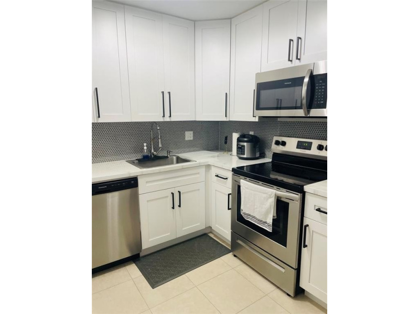 GREAT FIRST FLOOR FULLY RENOVATED THREE-BEDROOMS TWO BATHS - Beach Condo for sale in Coral Springs, Florida on Beachhouse.com