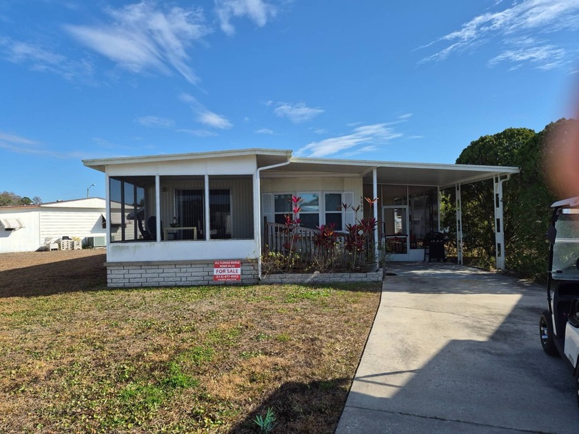 NICE 2 BEDROOM 2 BATH MOBILE HOME LOCATED IN HACIENDA VILLAGE IN - Beach Home for sale in New Port Richey, Florida on Beachhouse.com