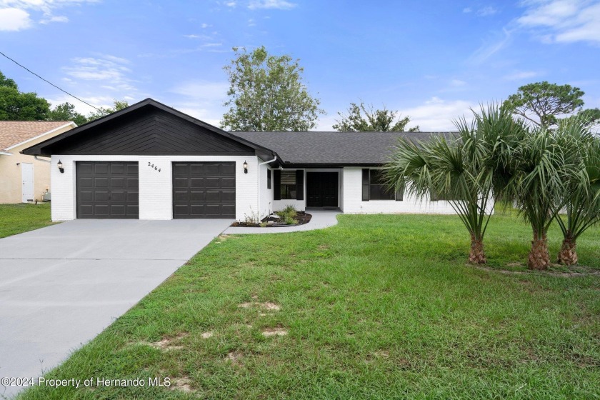 Tastefully remodeled 3 Bedroom 2.5 bath home in a great location - Beach Home for sale in Spring Hill, Florida on Beachhouse.com