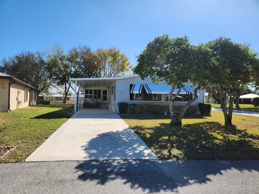 This spacious 2-bed/2-bath home with a den/family room situated - Beach Home for sale in Fort Pierce, Florida on Beachhouse.com