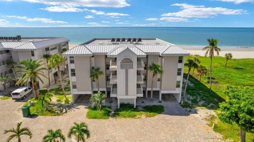 Rarely available, this sought after, corner-unit, residence in a - Beach Condo for sale in Sanibel, Florida on Beachhouse.com