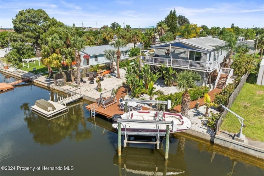 This 1993 3 Bedroom/2 Bath Elevated Waterfront Home is a - Beach Home for sale in Hudson, Florida on Beachhouse.com