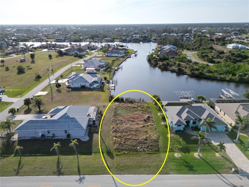 Waterfront Lot for Sale with 80 feet of concrete seawall.  Enjoy - Beach Lot for sale in Port Charlotte, Florida on Beachhouse.com