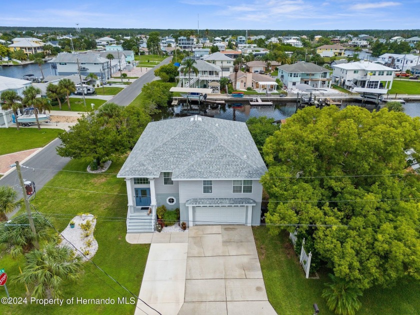 Discover your dream waterfront oasis in this beautifully - Beach Home for sale in Hernando Beach, Florida on Beachhouse.com