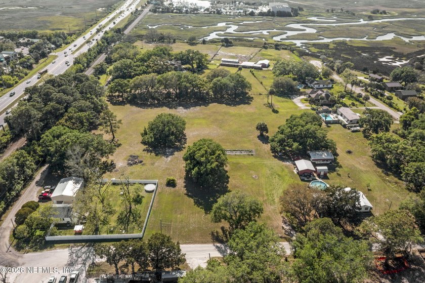 Discover the rare opportunity to own a full acre on Amelia - Beach Lot for sale in Fernandina Beach, Florida on Beachhouse.com