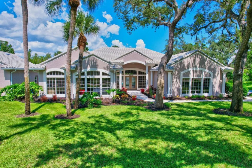 Discover this exquisite 4-bedroom, 3-bathroom estate home in an - Beach Home for sale in Fort Myers, Florida on Beachhouse.com