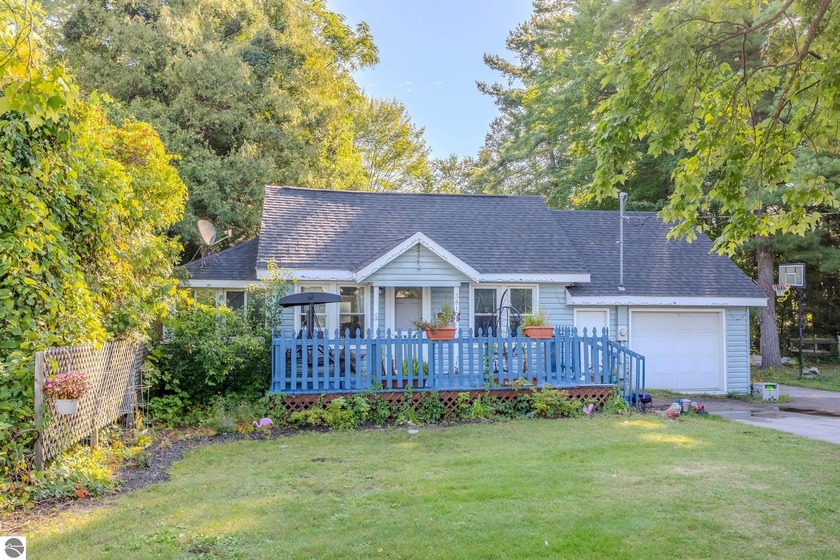Just a short walk from the shores of Lake Michigan, this - Beach Home for sale in Traverse City, Michigan on Beachhouse.com