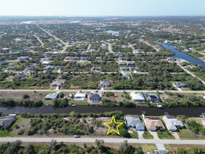 Enjoy 80 feet of shoreline with only one bridge out to open - Beach Lot for sale in Port Charlotte, Florida on Beachhouse.com