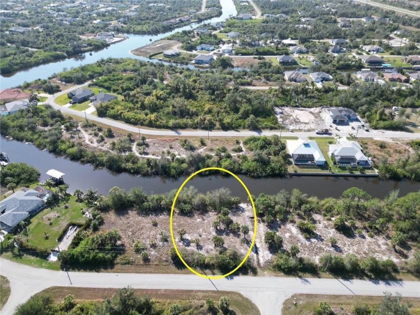 Waterfront Lot For Sale with 80 feet of shoreline overlooking - Beach Lot for sale in Port Charlotte, Florida on Beachhouse.com