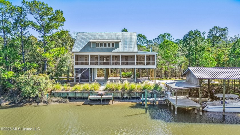 Welcome to this pristine Acadian style home which sits on six - Beach Home for sale in Pass Christian, Mississippi on Beachhouse.com