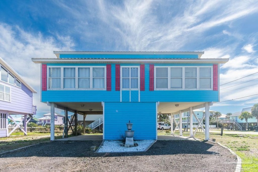 Embrace coastal living in this 3-bed, 2-bath retreat, steps from - Beach Home for sale in Gulf Shores, Alabama on Beachhouse.com