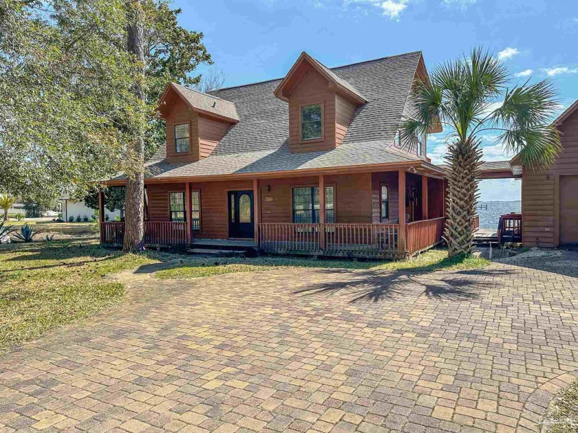 Welcome to your waterfront paradise!  This 4 bedroom home offers - Beach Home for sale in Gulf Breeze, Florida on Beachhouse.com