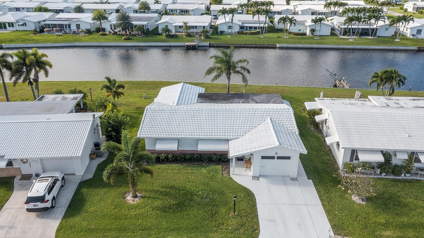 Nestled along a navigable 15+ mile waterway stretching from - Beach Home for sale in Boynton Beach, Florida on Beachhouse.com