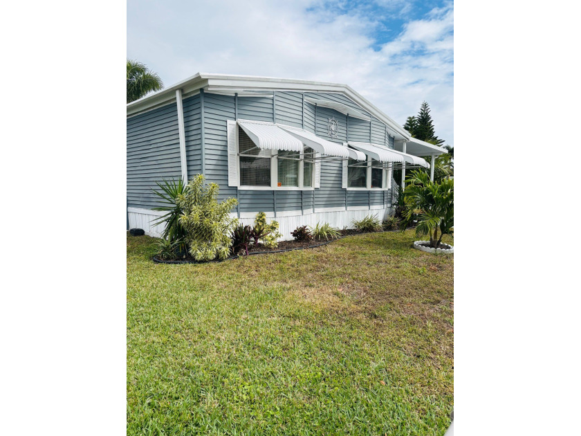 This beautiful 2/2 on the lake is a must see.  The pictures do - Beach Home for sale in Riviera Beach, Florida on Beachhouse.com