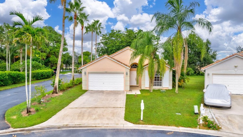 This beautiful 3-bedroom, 3-bathroom home features a desirable - Beach Home for sale in Wellington, Florida on Beachhouse.com