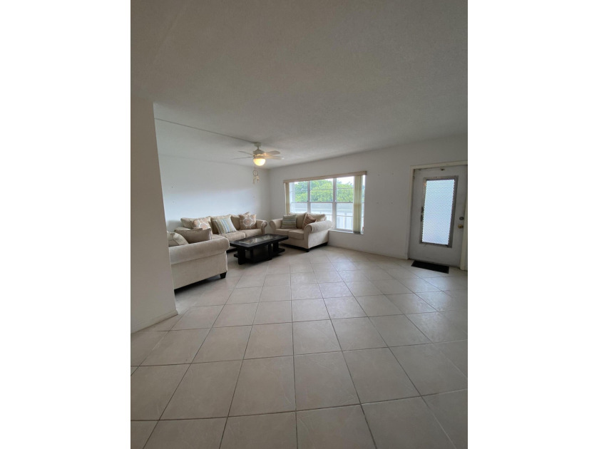 Take the elevator up to a fantastic lake view in this spacious 1 - Beach Condo for sale in West Palm Beach, Florida on Beachhouse.com