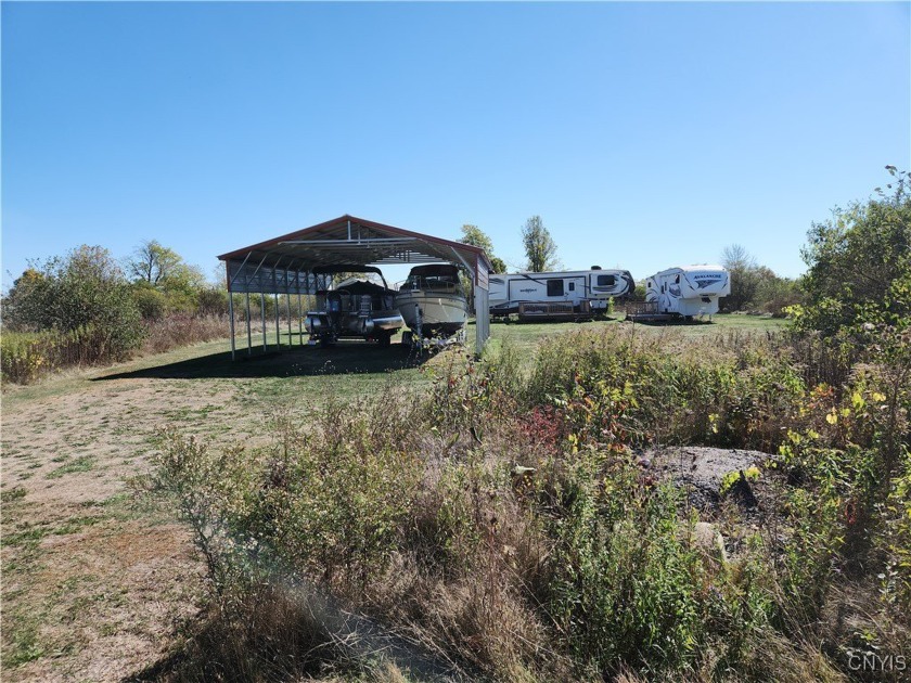 Discover the potential of this remarkable 3.08-acre property - Beach Acreage for sale in Cape Vincent, New York on Beachhouse.com