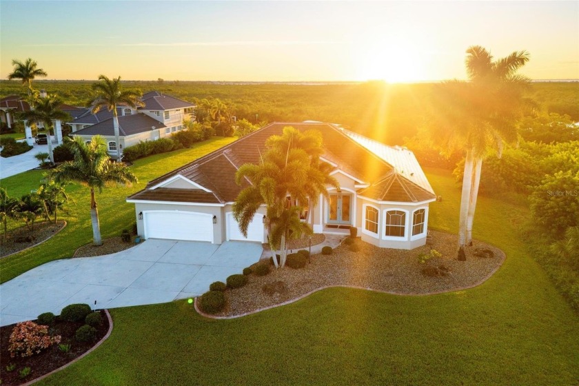 Embrace the art of coastal living at 19023 Midway Boulevard. A - Beach Home for sale in Port Charlotte, Florida on Beachhouse.com