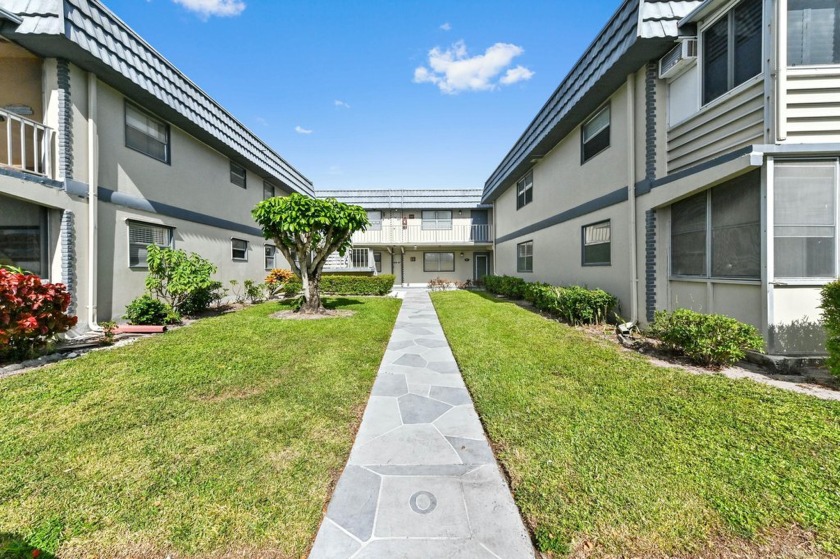 Experience serene lakeview living in this beautifully updated - Beach Condo for sale in Delray Beach, Florida on Beachhouse.com