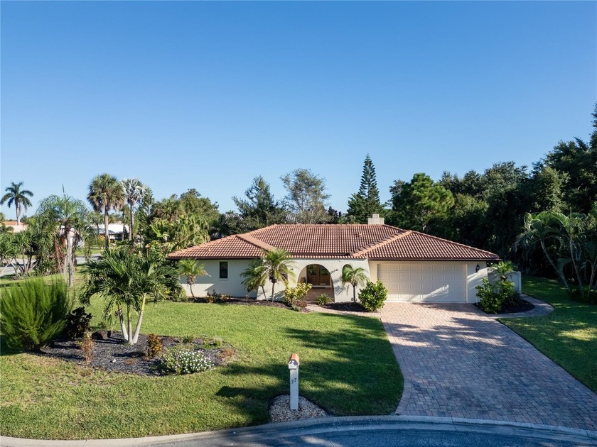 This Mediterranean style home is a must-see Experience. As soon - Beach Home for sale in Englewood, Florida on Beachhouse.com