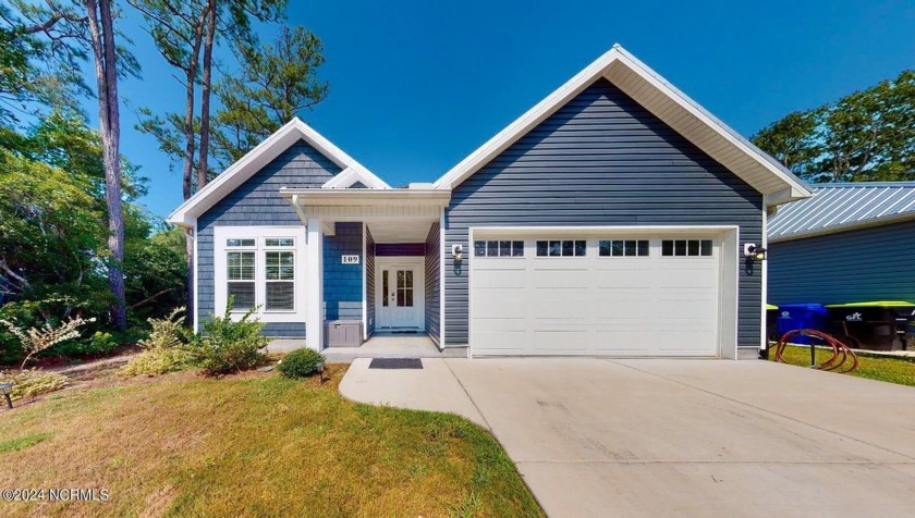 Welcome to this stunning 3-bedroom, 2 bath home, boasting a - Beach Home for sale in Oak Island, North Carolina on Beachhouse.com