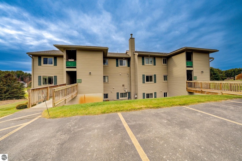 This turnkey lower level condo on 6th fairway of The Crown Golf - Beach Condo for sale in Traverse City, Michigan on Beachhouse.com