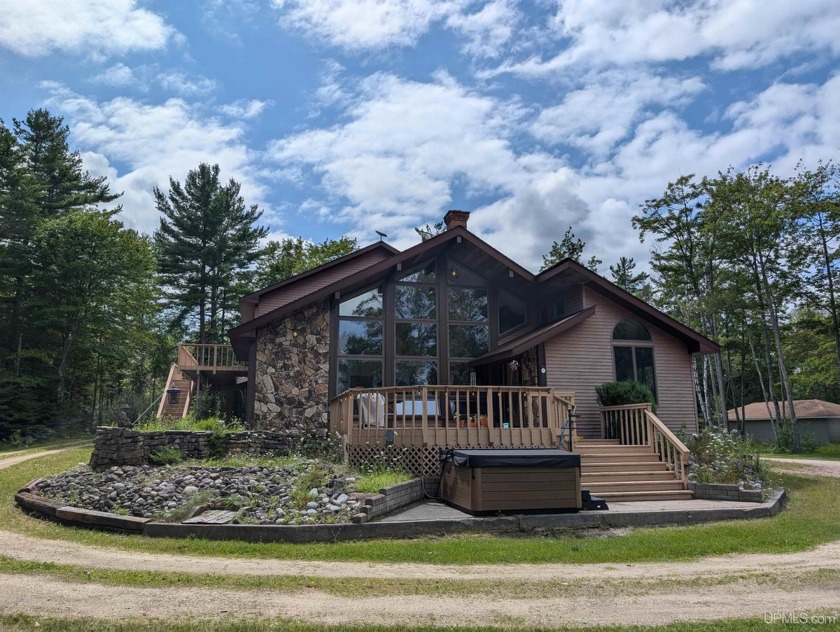 Discover scenic 840 acre Gulliver Lake and the beautiful sandy - Beach Home for sale in Gulliver, Michigan on Beachhouse.com