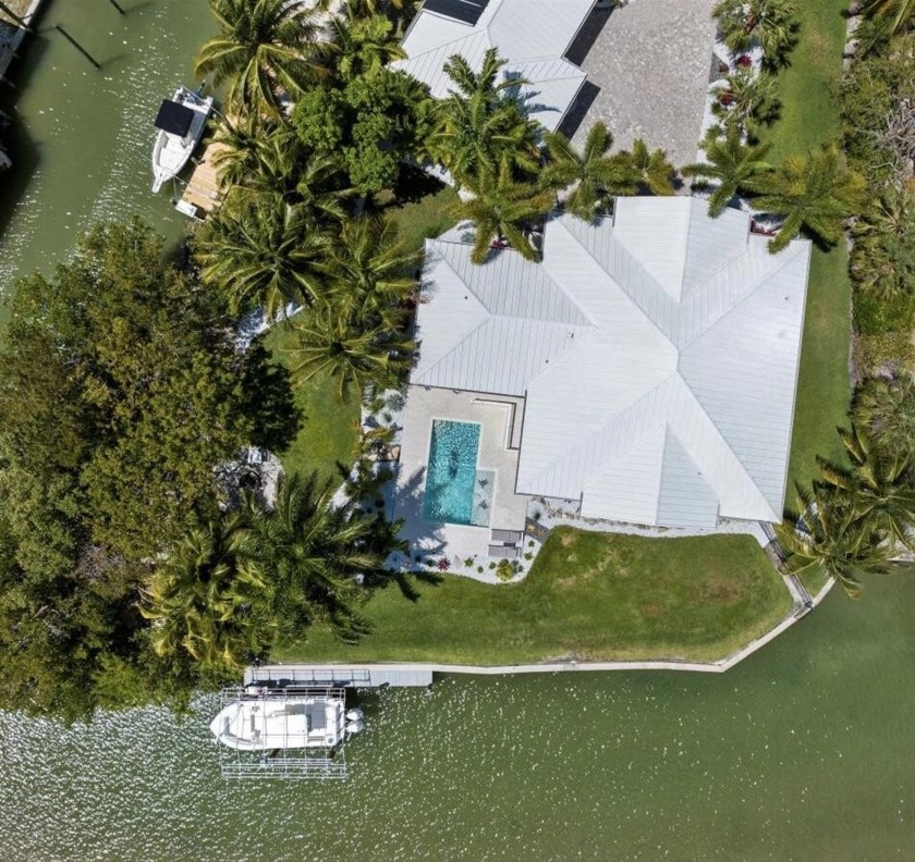 VIEWS!  PRIVACY!  NO RESTRICTIONS!  This beautiful Florida style - Beach Home for sale in Goodland, Florida on Beachhouse.com