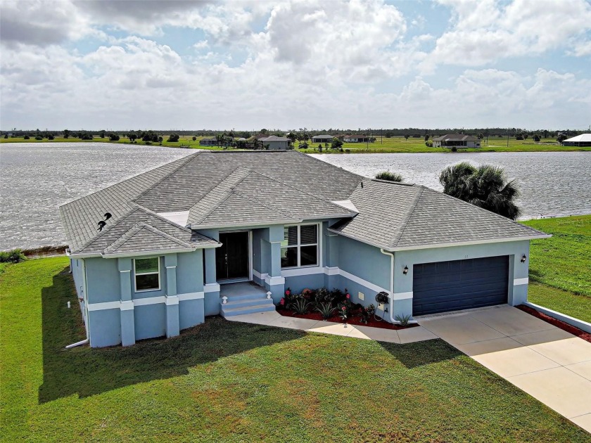 What a view! Welcome to your stunning lake view home! This - Beach Home for sale in Placida, Florida on Beachhouse.com