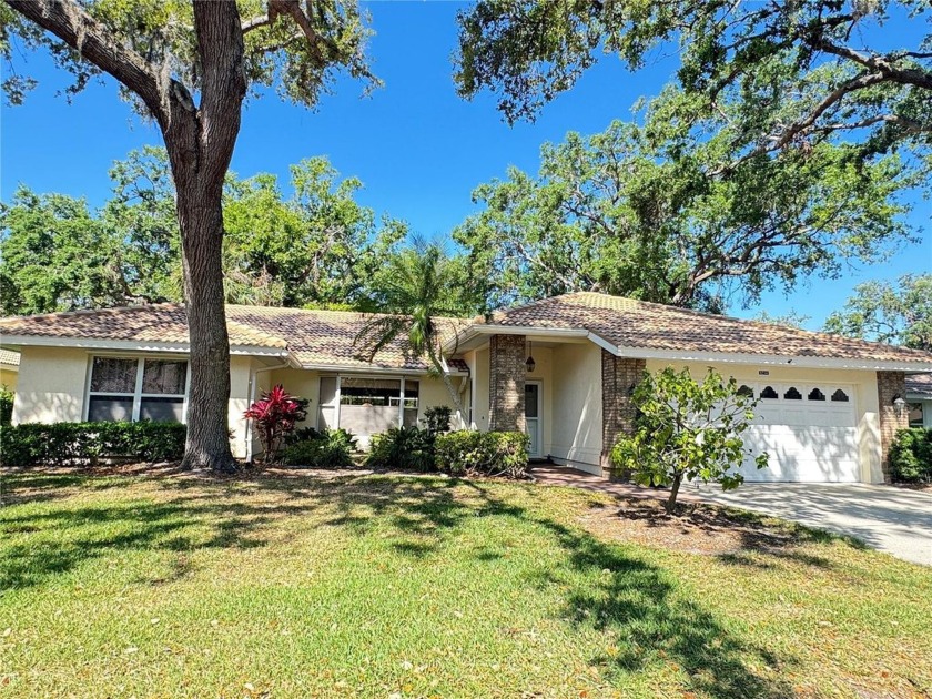 Step into the Florida vacation lifestyle in this beautifully - Beach Home for sale in Bradenton, Florida on Beachhouse.com