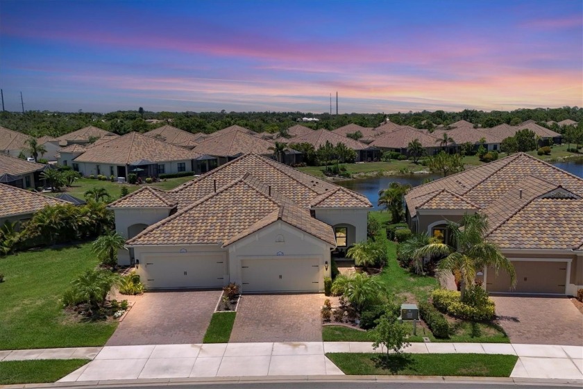 Seller Concessions with this beautiful lakefront Villa, in the - Beach Home for sale in Venice, Florida on Beachhouse.com