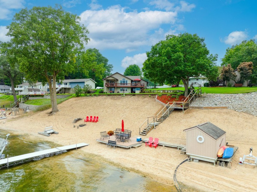 Welcome to 444 Whispering Oaks Drive, a large retreat situated - Beach Home for sale in Muskegon, Michigan on Beachhouse.com