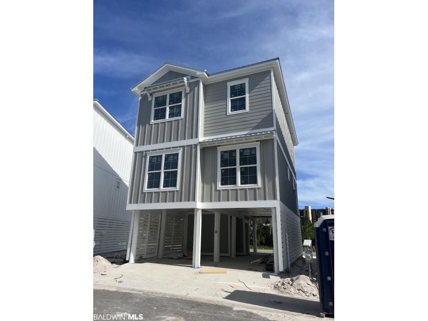 THIS CALMING COASTAL GRAY COTTAGE IS JUST RIGHT! Welcome to - Beach Home for sale in Orange Beach, Alabama on Beachhouse.com