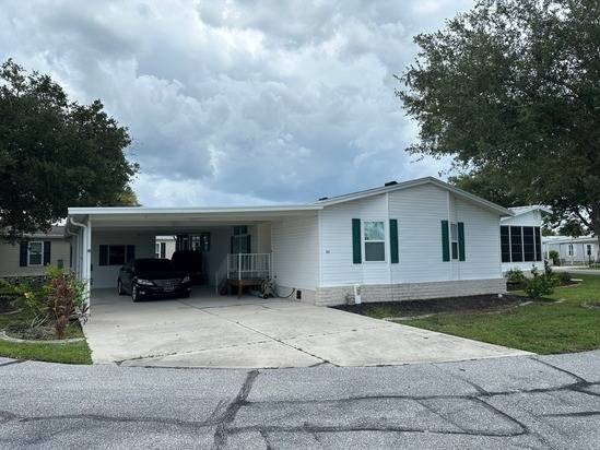 Welcome to 613 Woodwyn Court in the desirable Village at - Beach Home for sale in North Port, Florida on Beachhouse.com